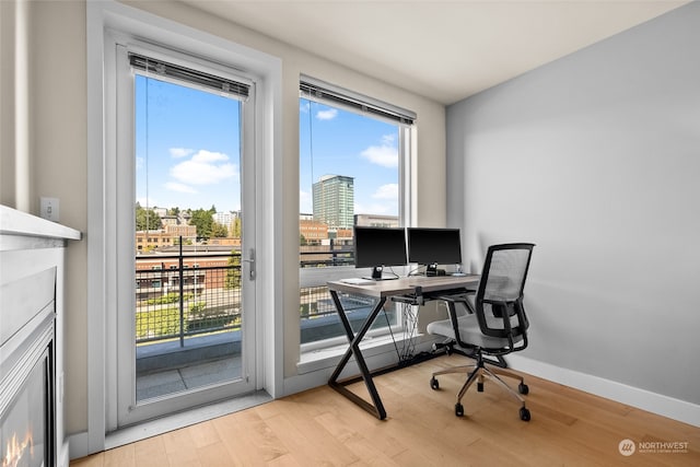 office area featuring light hardwood / wood-style flooring