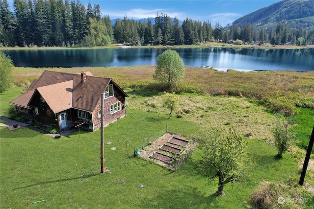 27525 W Lake Riley Rd, Arlington, WA 98223 - aerial view of property and surrounding area with a large body of water and a heavily wooded area
