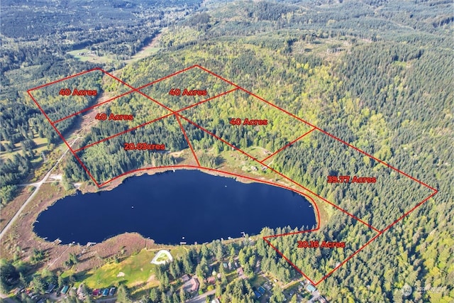 27525 W Lake Riley Rd, Arlington, WA 98223 - aerial view of property and surrounding area with a heavily wooded area, a large body of water, and property boundaries highlighted