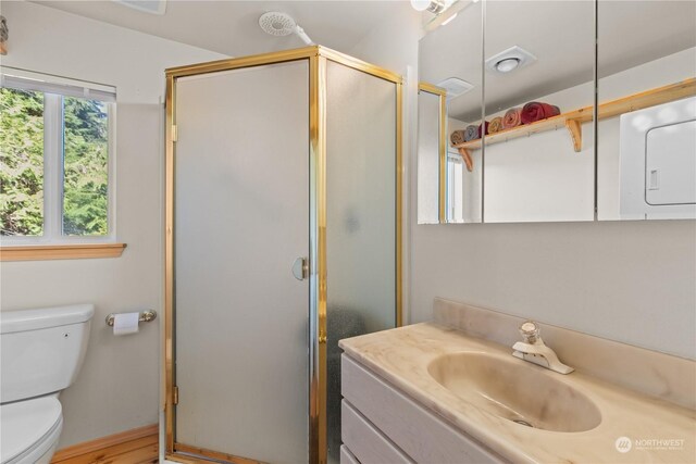 27525 W Lake Riley Rd, Arlington, WA 98223 - full bathroom with vanity, toilet, and a shower stall