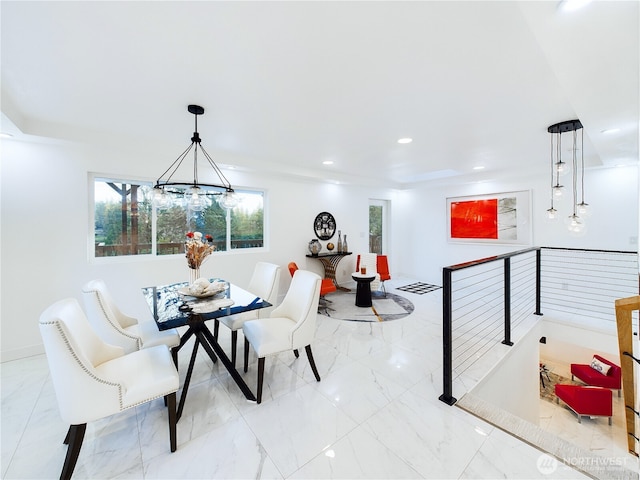 dining room with marble finish floor, a notable chandelier, and recessed lighting