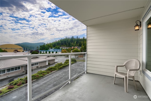 balcony featuring a mountain view