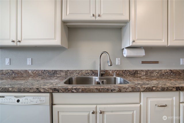 kitchen featuring white cabinetry, dishwasher, and sink