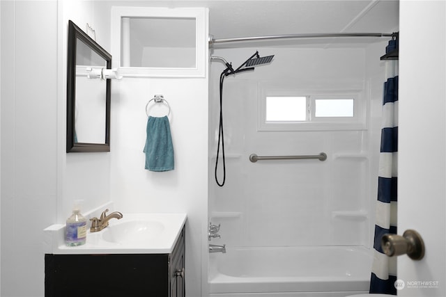 bathroom featuring vanity and shower / bath combination with curtain