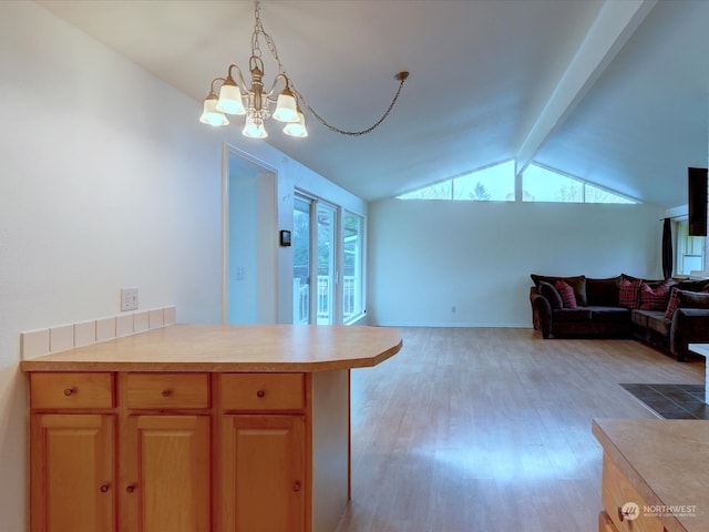 kitchen featuring lofted ceiling with beams, decorative light fixtures, light wood-type flooring, a notable chandelier, and kitchen peninsula