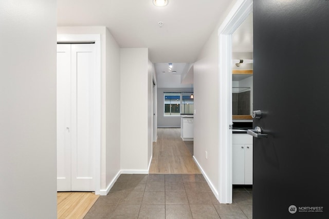 hallway featuring light hardwood / wood-style flooring