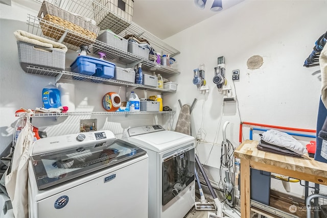 laundry area featuring washing machine and clothes dryer