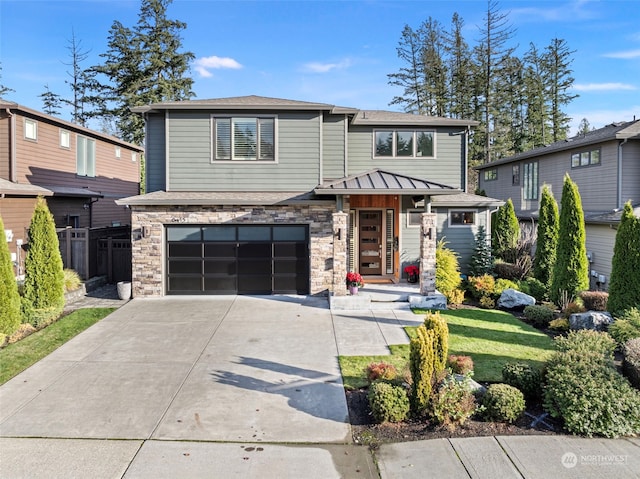 view of front of property featuring a garage