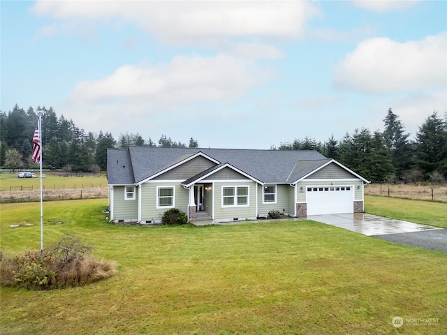 view of front of house with a front lawn and a garage