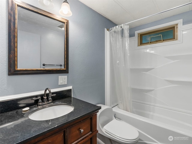 full bathroom featuring shower / bath combo, vanity, and toilet