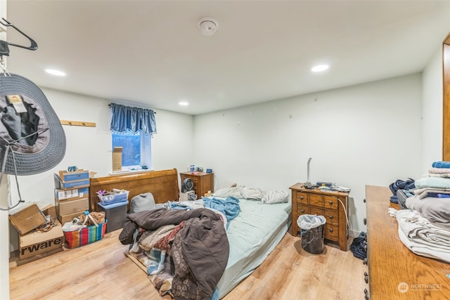 bedroom featuring wood-type flooring