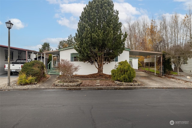 view of front of house with a carport