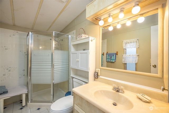 bathroom featuring vanity, lofted ceiling, tile patterned floors, toilet, and walk in shower