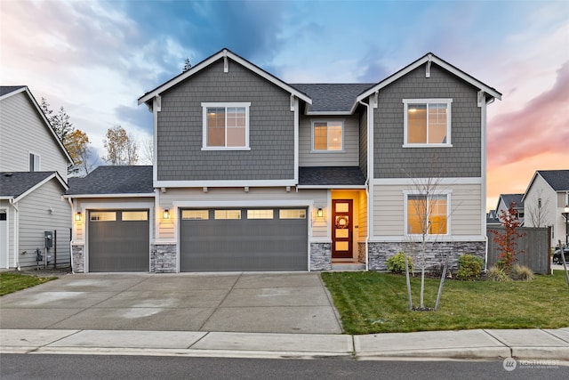 craftsman-style house featuring a yard