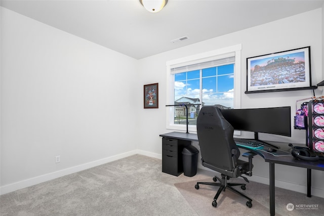 home office with light colored carpet