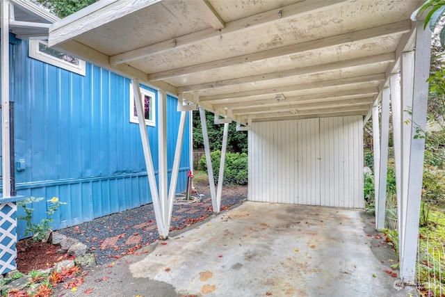 view of patio featuring a carport