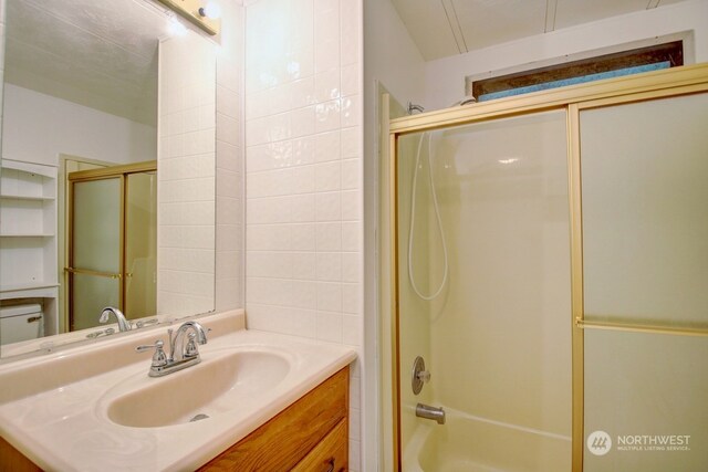 bathroom with vanity and tub / shower combination