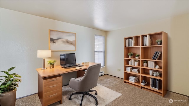 carpeted office with a baseboard heating unit