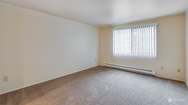 empty room with carpet and baseboard heating