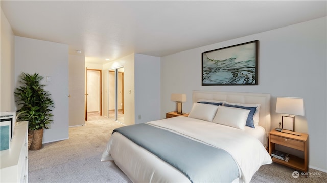 carpeted bedroom featuring a closet