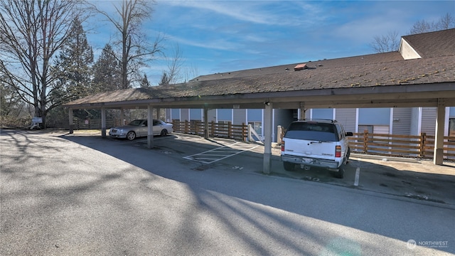 view of parking with a carport