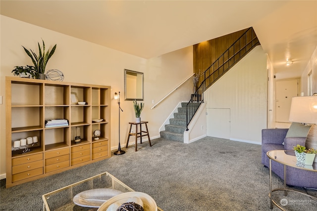 living room featuring dark colored carpet