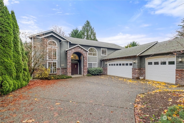 view of front of property with a garage