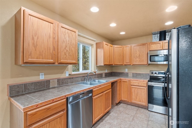 kitchen with sink and stainless steel appliances