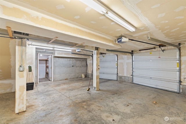 garage featuring a garage door opener