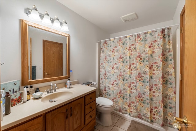 bathroom with tile patterned flooring, vanity, toilet, and a shower with shower curtain