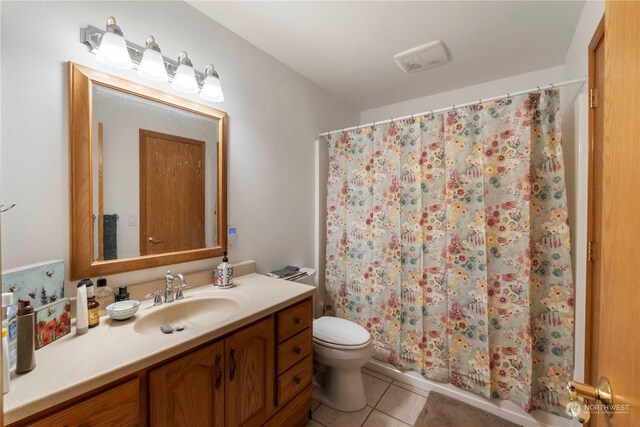 2245 Salzer Valley Rd, Centralia, WA 98531 - bathroom with vanity, tile patterned flooring, toilet, and a shower with shower curtain