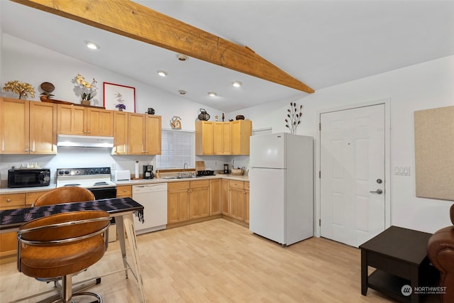 19731 Canyon Dr, Granite Falls, WA 98252 - kitchen featuring light brown cabinets, lofted ceiling, white appliances, sink, and light hardwood / wood-style floors