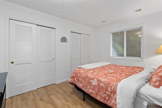 19731 Canyon Dr, Granite Falls, WA 98252 - bedroom with light hardwood / wood-style flooring and multiple closets