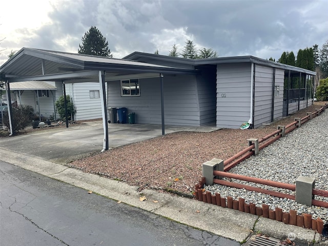 exterior space featuring a carport