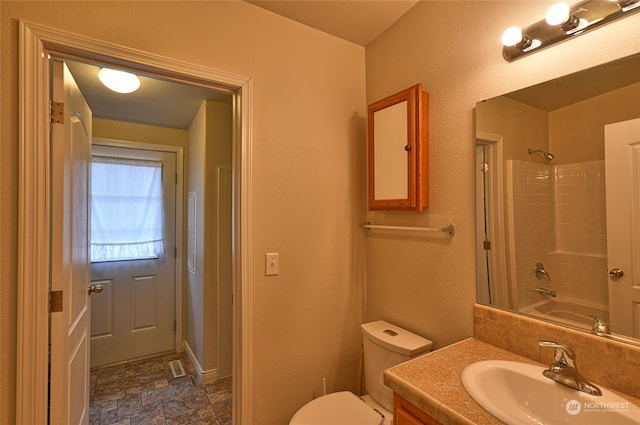 full bathroom with vanity, toilet, and bathing tub / shower combination