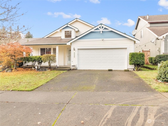 view of front facade featuring a front lawn and a garage