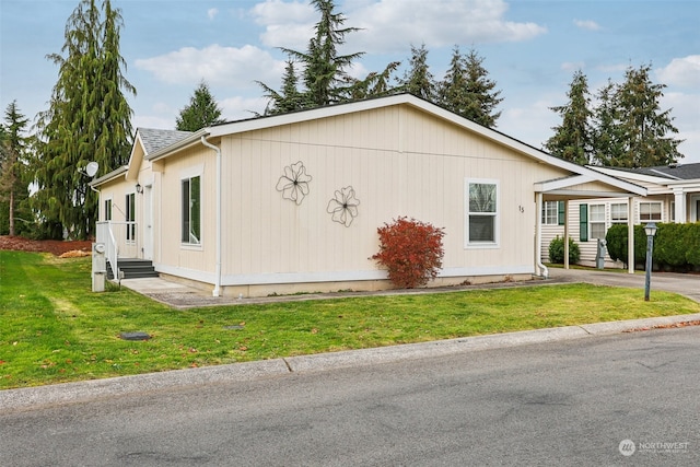 view of property exterior featuring a yard