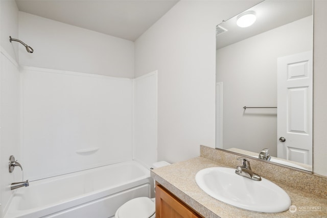 full bathroom featuring shower / bathing tub combination, vanity, and toilet