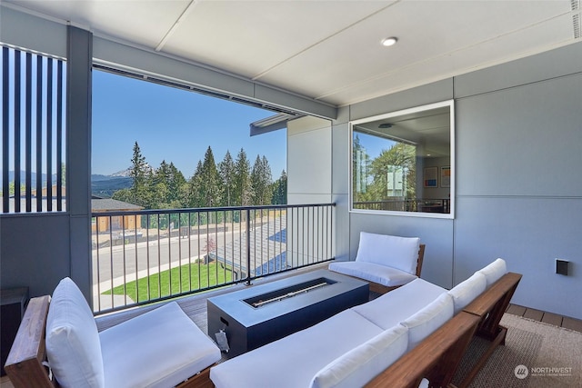 17726 142nd Ave E Unit 9, Puyallup, WA 98374 - view of patio with an outdoor hangout area, a balcony, and a mountain view