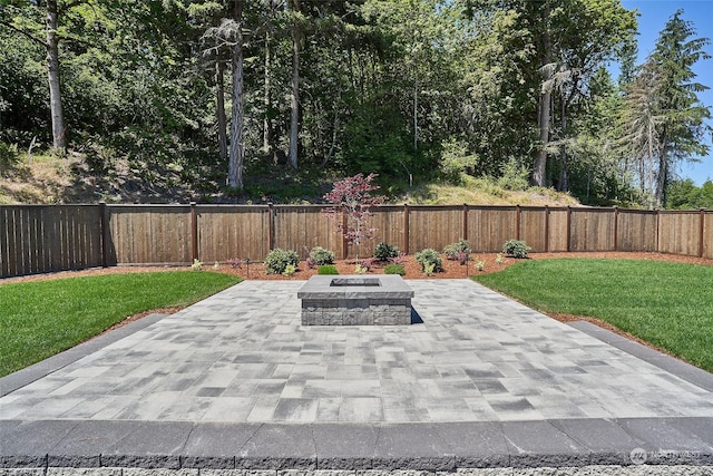 17726 142nd Ave E Unit 9, Puyallup, WA 98374 - view of patio / terrace with an outdoor fire pit