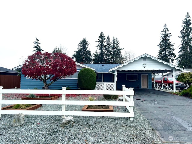 view of front of house featuring a carport