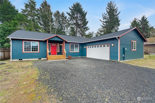 ranch-style house featuring a garage