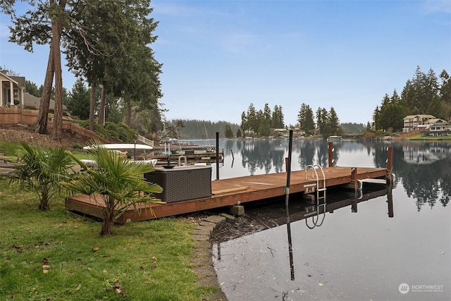 view of dock featuring a water view