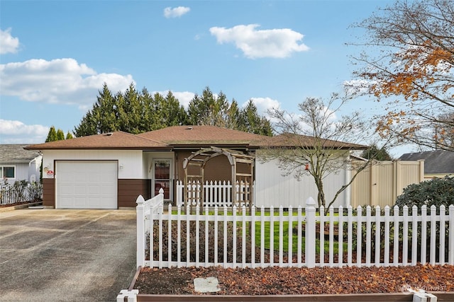 view of front of home with a garage