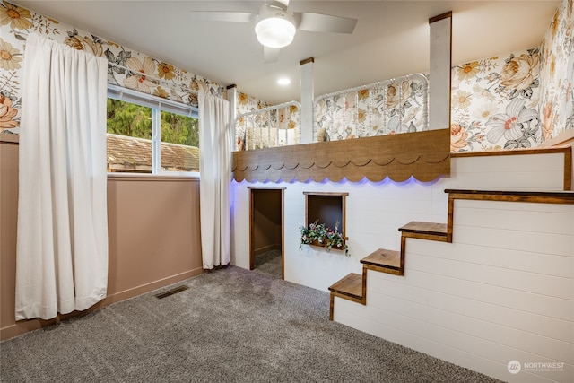 kitchen featuring carpet flooring and ceiling fan