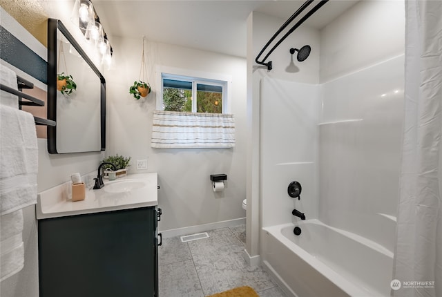 full bathroom with tile patterned floors, vanity, toilet, and shower / bathtub combination with curtain