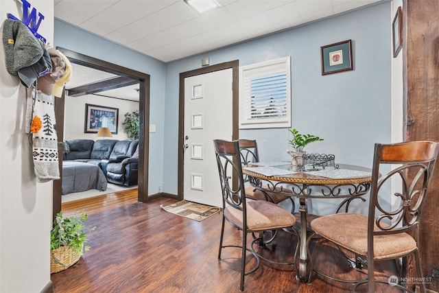 dining room with hardwood / wood-style floors