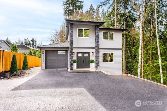 view of front of property featuring a garage