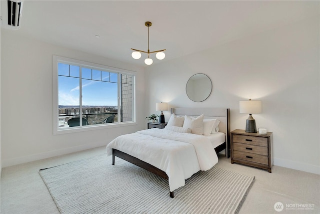 bedroom featuring baseboards and light colored carpet