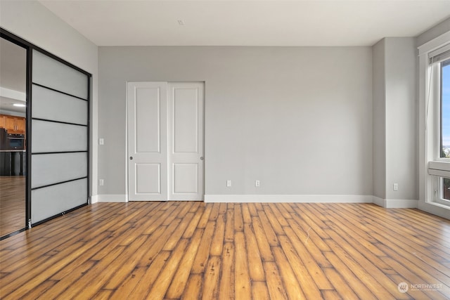 unfurnished bedroom featuring light hardwood / wood-style floors